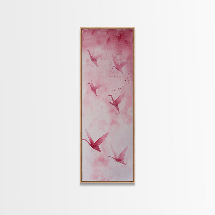 Crane Flight Canvas Print, ethereal origami bird painting in pink abstract hues, tall narrow wall art with zen minimalist aesthetic.