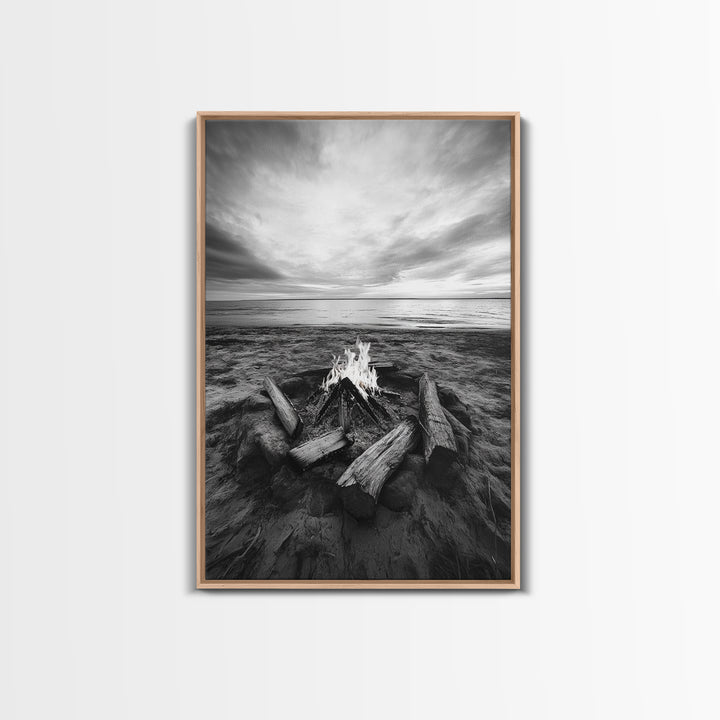 Coastal campfire glow, serene seaside bonfire, sunset flames, sandy warmth, Framed Canvas Print, Fall decor, cozy cabin wall art