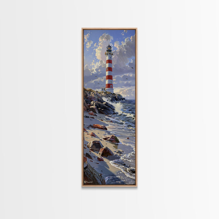 Framed Canvas Print Skinny Art of a Majestic Lighthouse Standing Tall Against a Bright Blue Sky with Waves Crashing on Rocky Shores, Perfect Tall Art