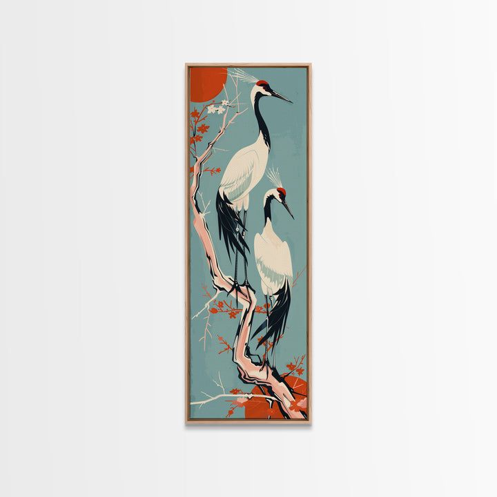 Pair Of Cranes Perched On Branch Against Orange Sun Background Skinny Art Wood Block Print Framed Canvas Print