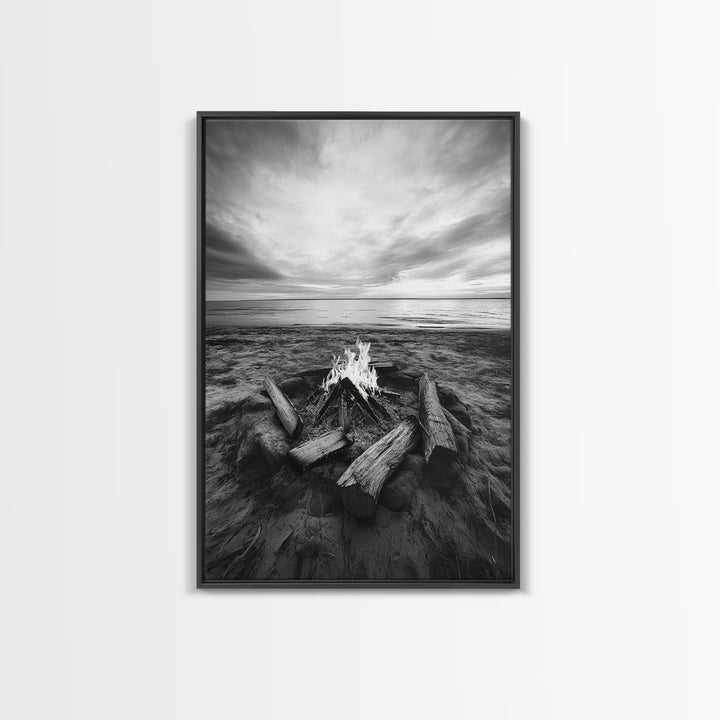 Coastal campfire glow, serene seaside bonfire, sunset flames, sandy warmth, Framed Canvas Print, Fall decor, cozy cabin wall art