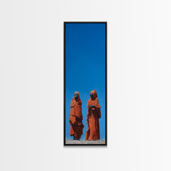 Two African Women In Orange Robes Wall Art, Minimalist Desert Portrait, Blue Sky Cultural Decor, Afrocentric Canvas Print