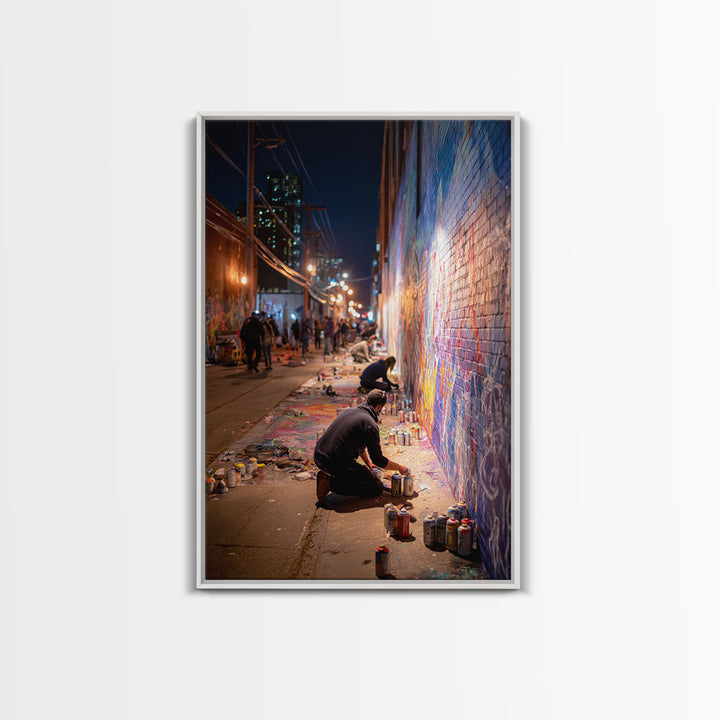 Nighttime Street Artist Painting Bright Graffiti Mural On City Wall - Colorful Wall Art Framed Canvas Print For Home