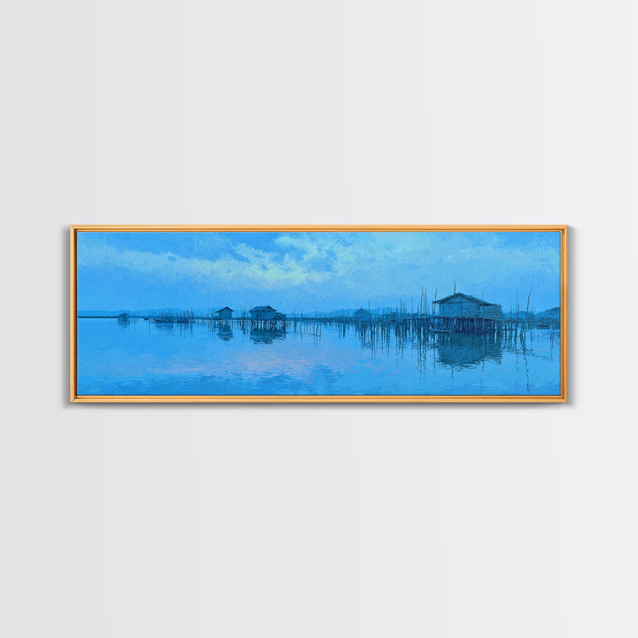Blue Stilt Village Over Water Framed Canvas Print, Minimalist African Landscape Wall Art, Coastal Home Decor, Serene Gift