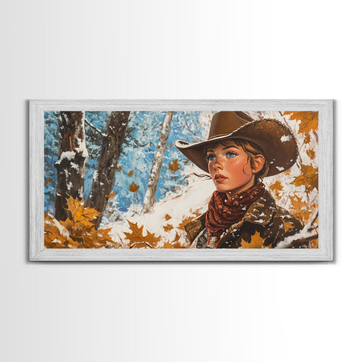 Western-inspired Framed Canvas Print of a woman on horseback in a snowy mountain landscape, holiday wall art and winter wonderland vibes