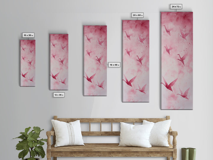 Crane Flight Canvas Print, ethereal origami bird painting in pink abstract hues, tall narrow wall art with zen minimalist aesthetic.