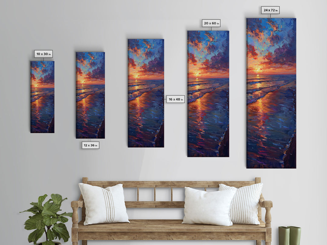 Framed Canvas Print of a Colorful Skinny Art Sunset Over the Ocean with a Vibrant Sky Reflecting on the Water in this Tall Coastal Landscape Art