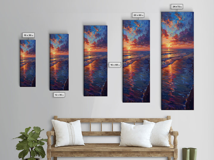 Framed Canvas Print of a Colorful Skinny Art Sunset Over the Ocean with a Vibrant Sky Reflecting on the Water in this Tall Coastal Landscape Art