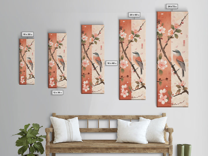 Japanese Bird Art Skinny Wall Art Framed Canvas Print Perched Bird on Branch with Cherry Blossoms and Petals in Soft Pastel Colors