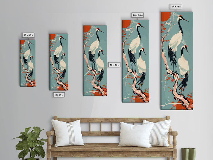 Pair Of Cranes Perched On Branch Against Orange Sun Background Skinny Art Wood Block Print Framed Canvas Print