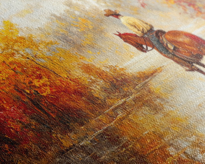 Cowboy sitting by campfire near a lake in the woods with autumn leaves, Framed Canvas Print, moody fall wall art, rustic western home decor