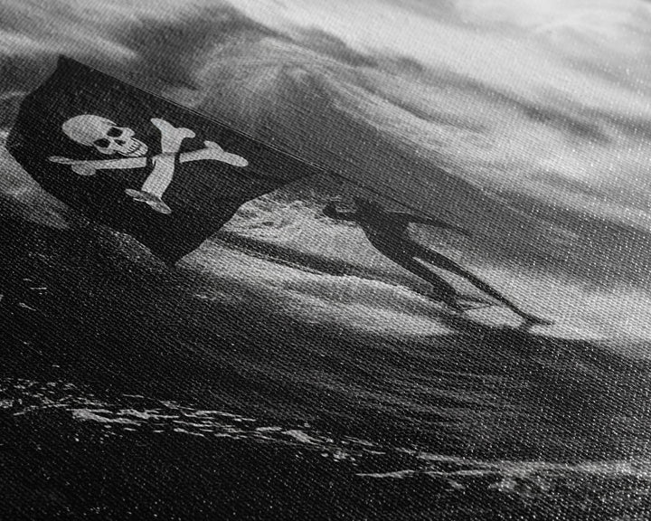 Surfer Waving A Skull and Crossbones Flag While Surfing - Framed Canvas Print - Cool Modern Art - Office / Mancave Decor Gift For Him