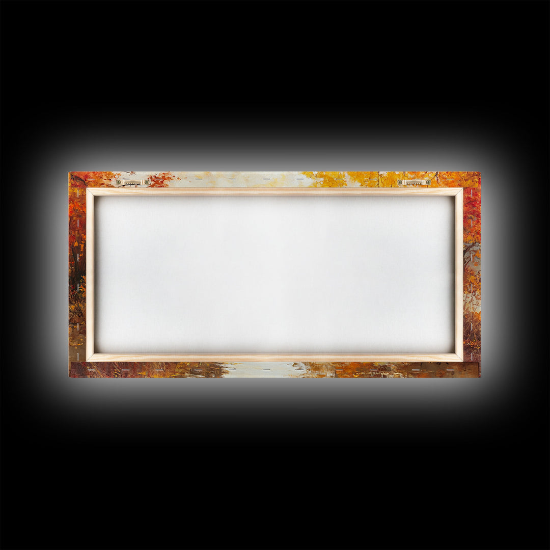 Cowboy sitting by campfire near a lake in the woods with autumn leaves, Framed Canvas Print, moody fall wall art, rustic western home decor