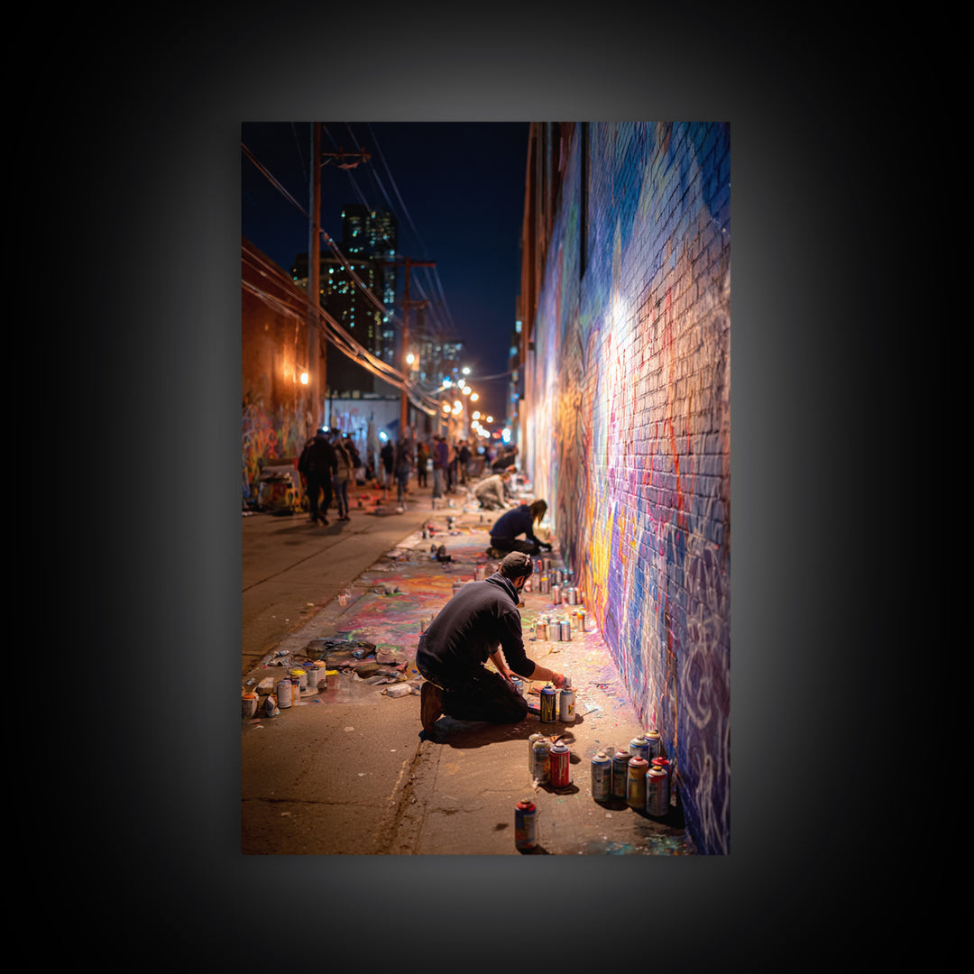 Nighttime Street Artist Painting Bright Graffiti Mural On City Wall - Colorful Wall Art Framed Canvas Print For Home