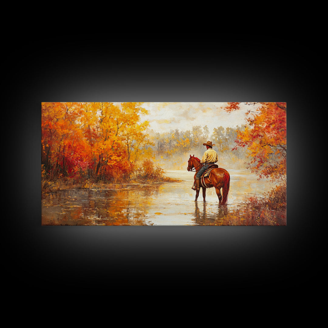 Cowboy sitting by campfire near a lake in the woods with autumn leaves, Framed Canvas Print, moody fall wall art, rustic western home decor