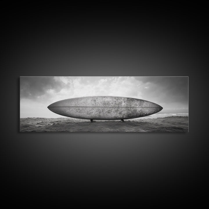 Surfboard Alone, Beach Sand, Cloudy Sky, Framed Canvas Print, minimalist surf art, coastal man cave decor, surf lover gift idea