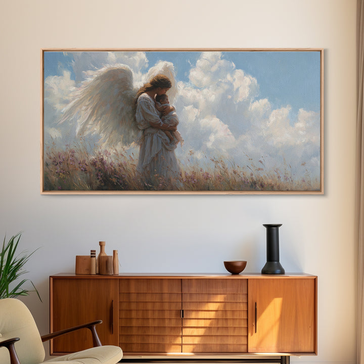 Angel Mother Cradling Baby Beneath Bright Clouds Framed Canvas Print, Christian Wall Art, Nursery Decor, Spiritual Gift For Her