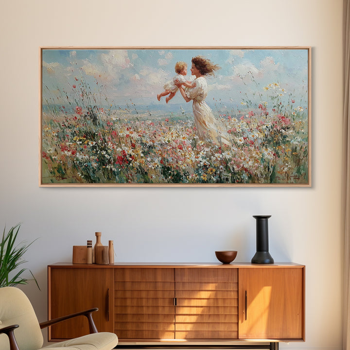 Mother Holding Baby In Seaside Wildflower Meadow Wall Art, Coastal Canvas Print For Nursery Decor And Mothers Day Gift For Her