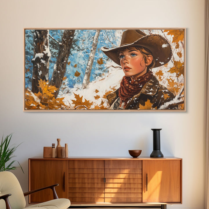 Western-inspired Framed Canvas Print of a woman on horseback in a snowy mountain landscape, holiday wall art and winter wonderland vibes