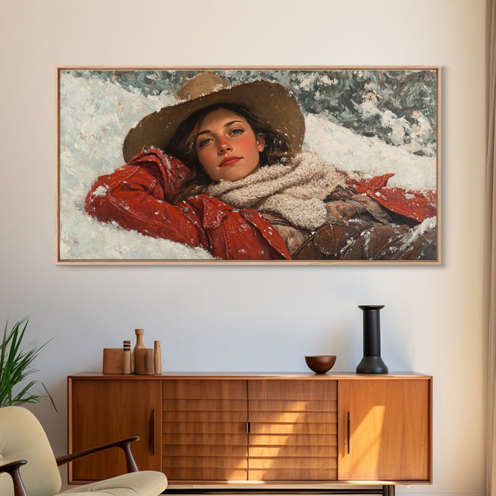 Cowgirl Laying In The Snow Framed Canvas Print, Cute Rustic Decor, Cowgirl Portrait Painting, Winter Wall Art