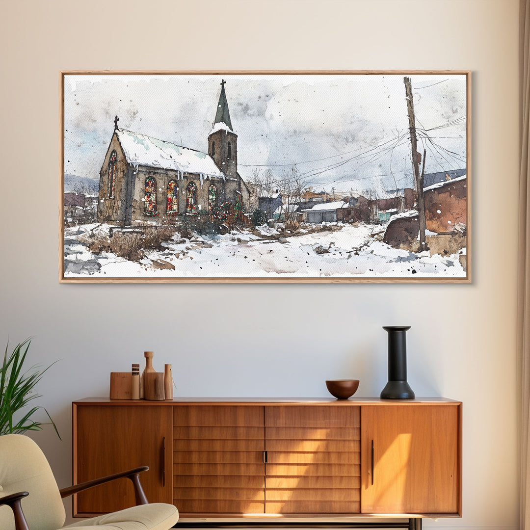 Snowy church scene framed canvas print, stained glass church in winter with snow-covered rooftops, perfect Christmas or holiday art display