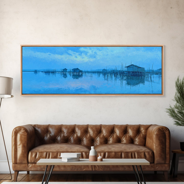 Blue Stilt Village Over Water Framed Canvas Print, Minimalist African Landscape Wall Art, Coastal Home Decor, Serene Gift