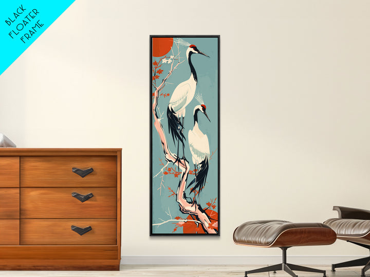 Pair Of Cranes Perched On Branch Against Orange Sun Background Skinny Art Wood Block Print Framed Canvas Print