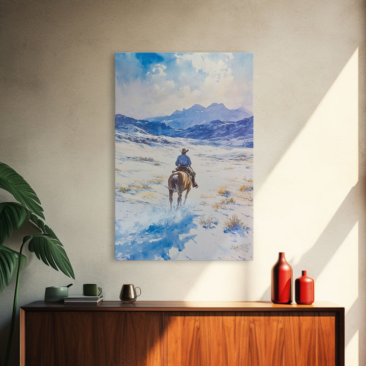 Cowboy riding through snowy mountain pass, Framed Canvas Print, western winter landscape wall art, farmhouse holiday decor Christmas gift