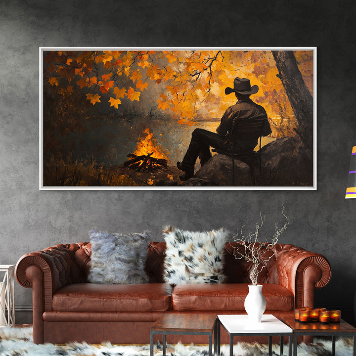 Cozy autumnal Framed Canvas Print featuring a woman with a mug, surrounded by vibrant fall leaves, perfect seasonal wall art for cozy spaces