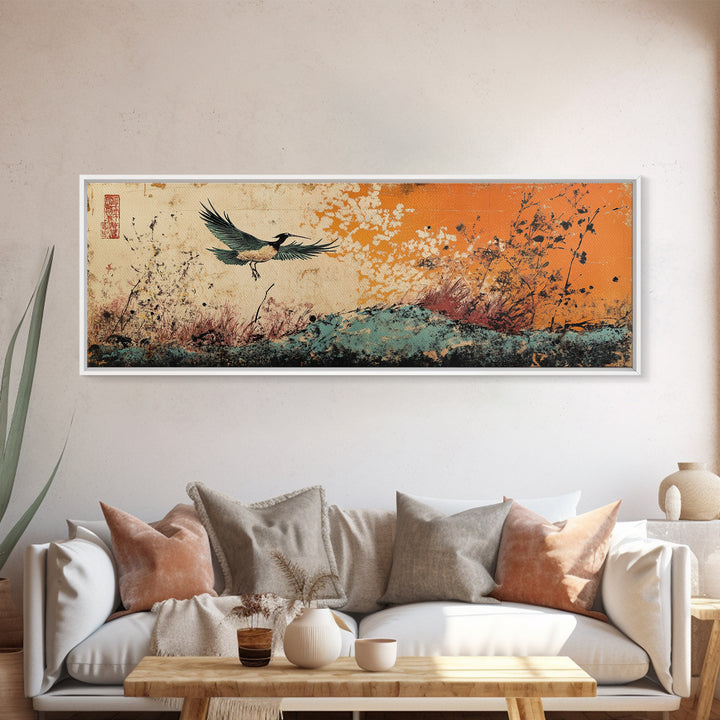 Flying Crane Over Floral Meadow Canvas Print, Japanese Bird Wall Art, Orange Sky Nature Art, Large Living Room Home Decor
