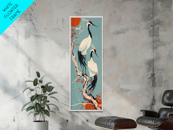Pair Of Cranes Perched On Branch Against Orange Sun Background Skinny Art Wood Block Print Framed Canvas Print