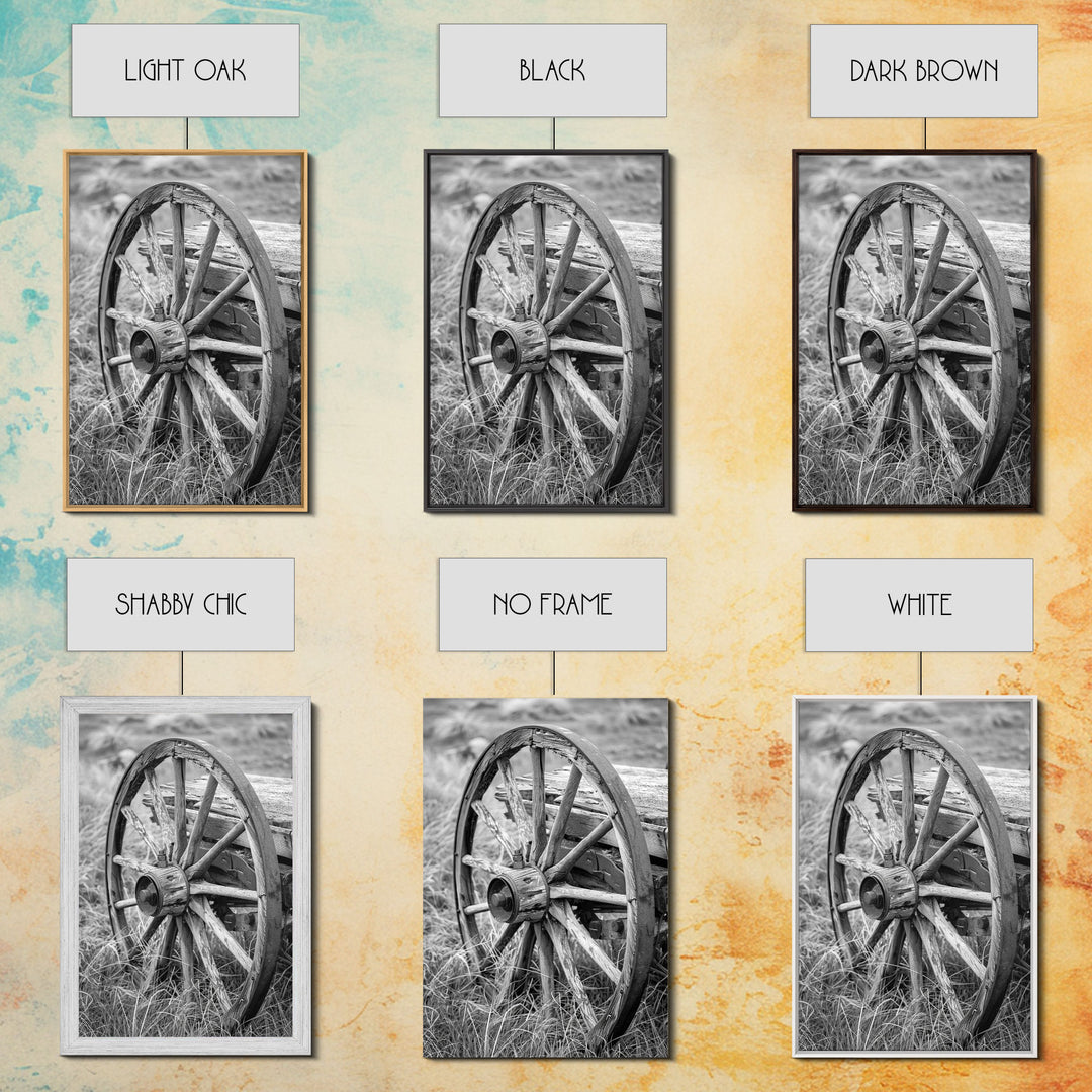 Weathered wagon wheel in tall grass, black and white photography, Framed Canvas Print, rustic Western decor, vintage wall art for home